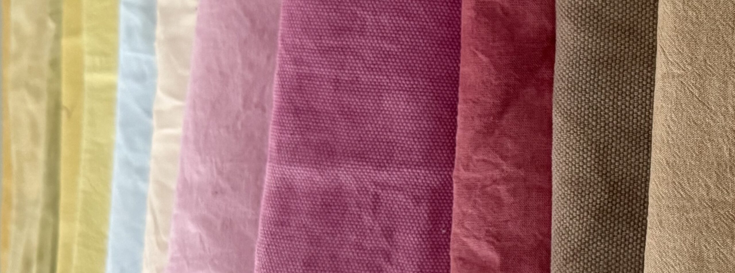 Matchi's Collection of fabrics dyed with natural pigments from plants, flowers and minerals, showing a range of unique colours